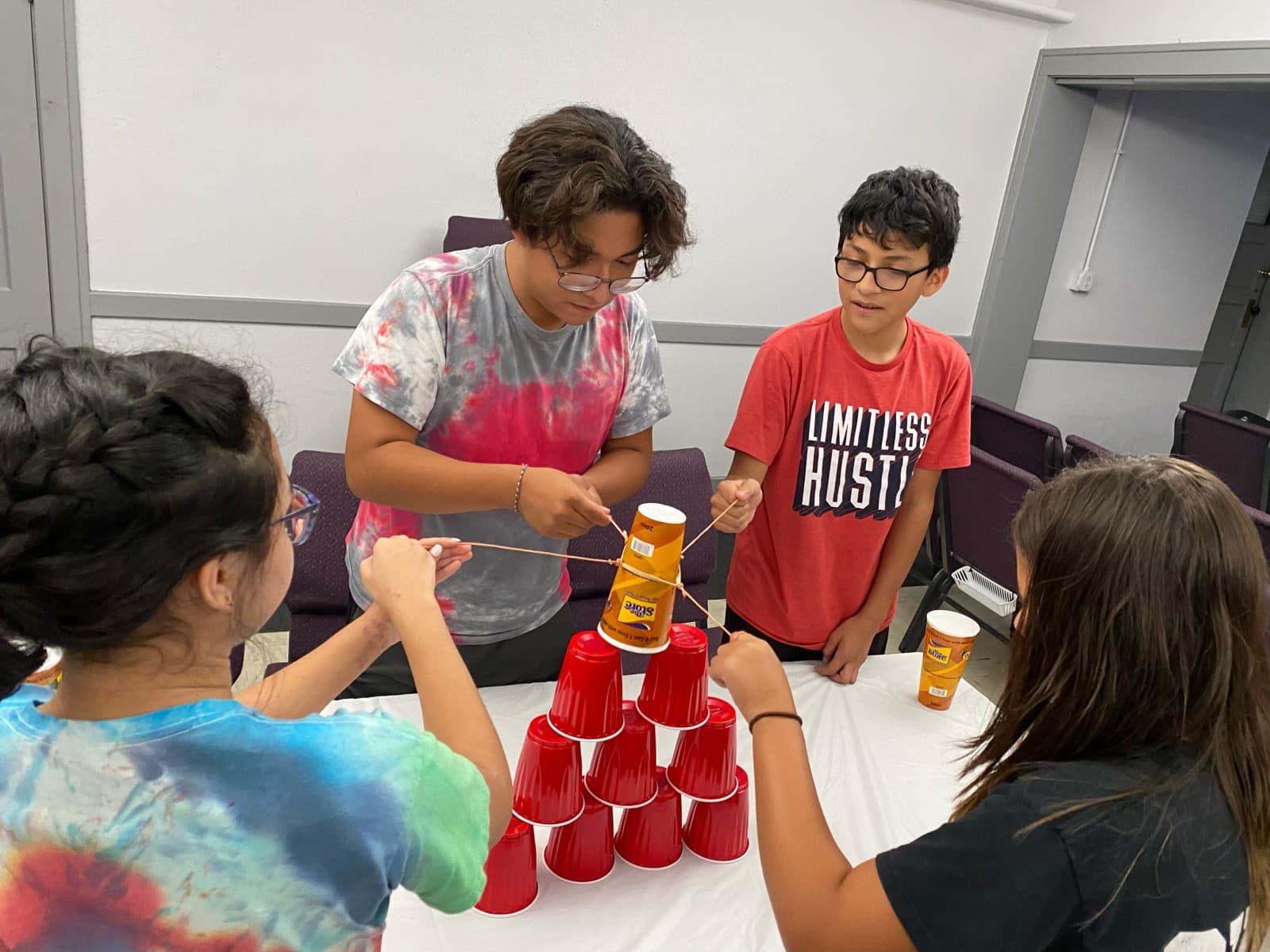 Students working together at Element Youth Ministry